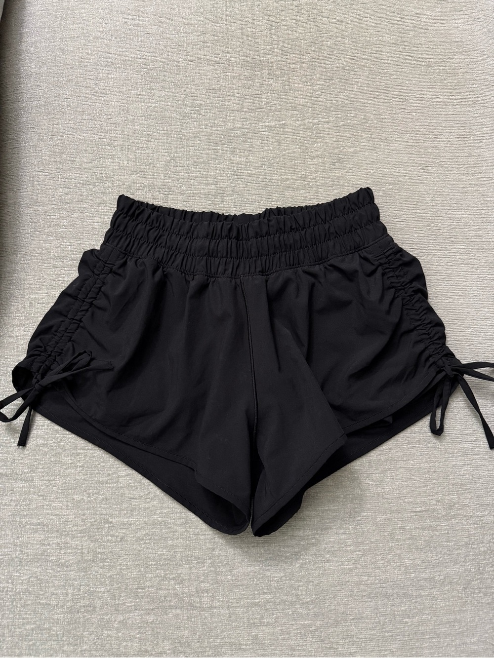 Offline Women's Black Athletic shorts with bow side ties.